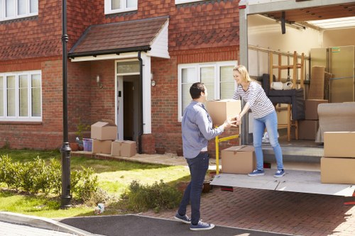 Office relocation service with boxes and equipment in Finchley