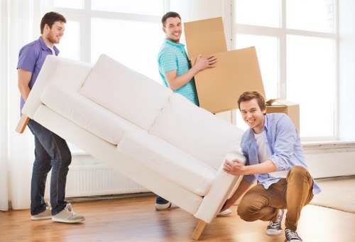 Furniture being secured in a moving vehicle with straps