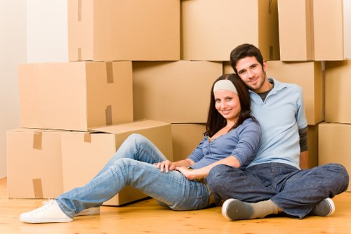 Movers planning a residential removal in Finchley with boxes and furniture