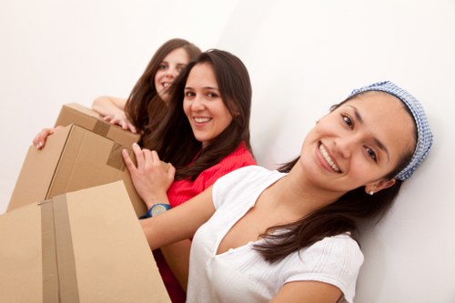Careful furniture handling during a home move in Finchley