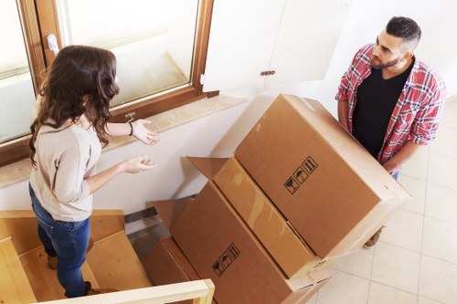 Loading furniture carefully during a home move in Finchley