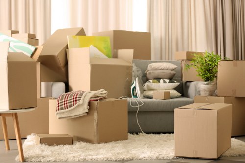 Professional movers transporting household items in Finchley