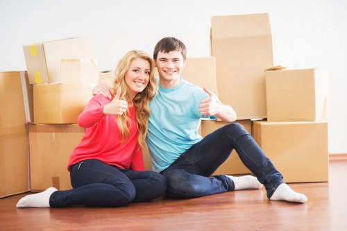 Organized boxes and furniture inside a moving truck