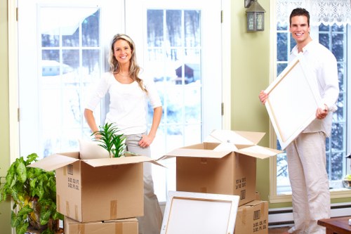 Team handling furniture carefully during a relocation job
