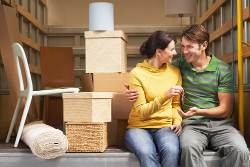 Packed boxes and furniture prepared for removal truck hire